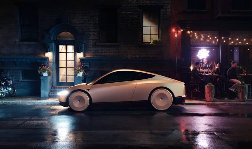 Tesla Cybercab vu de profil dans une rue, de nuit